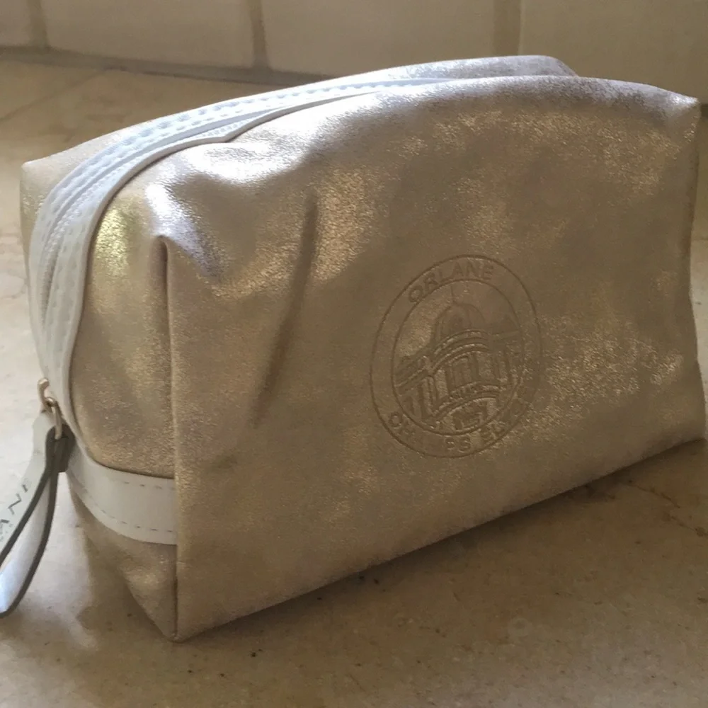 Gold distressed Orlane Paris makeup/cosmetic bag